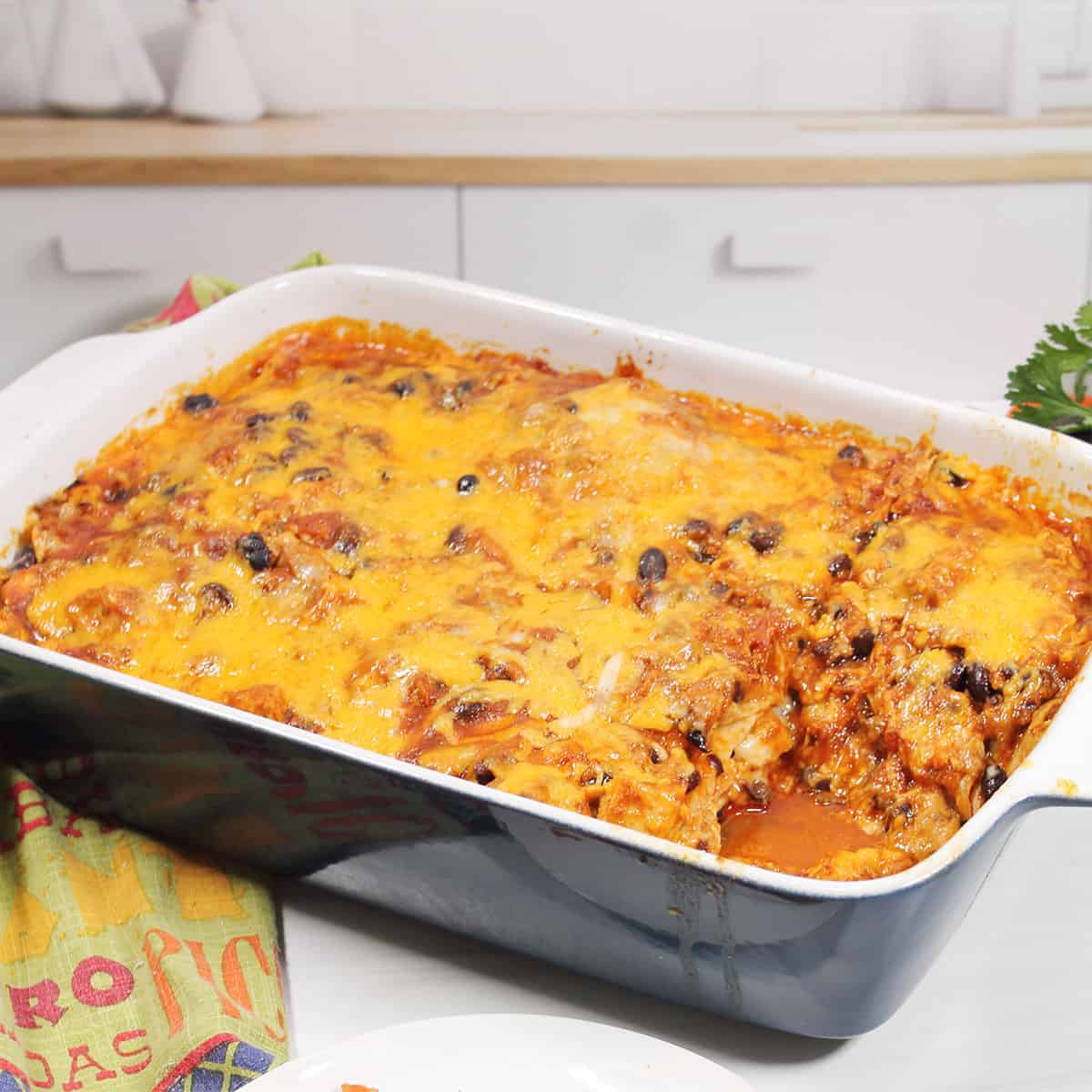 Baked casserole with serving taken out.