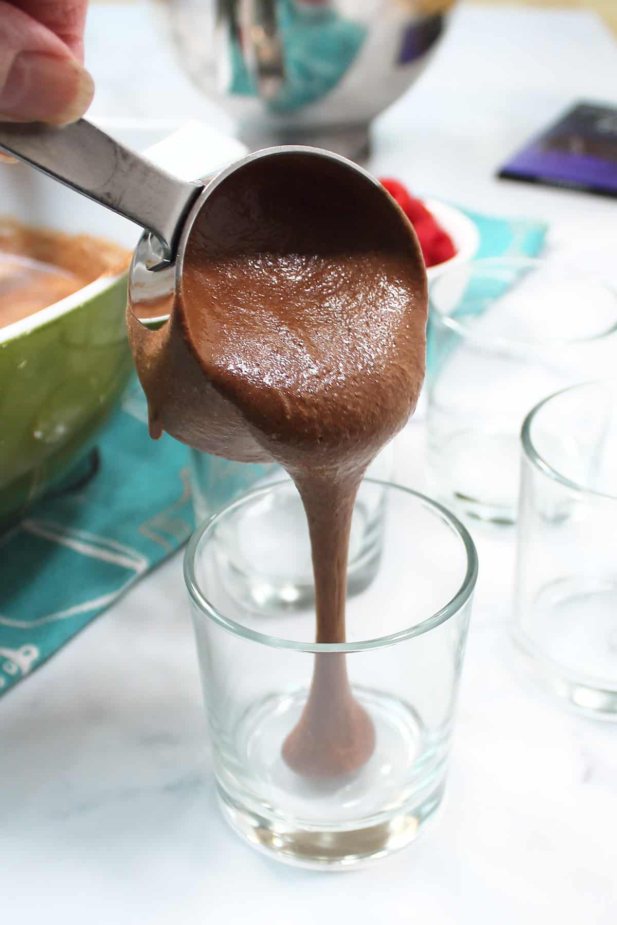 Pouring coffee mousse into serving dish.