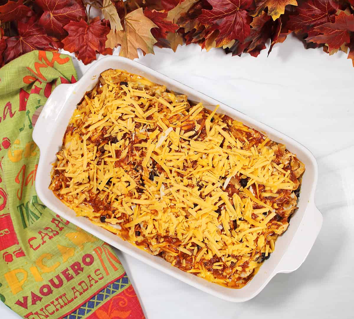 Sprinkle cheese on top prior to second bake.