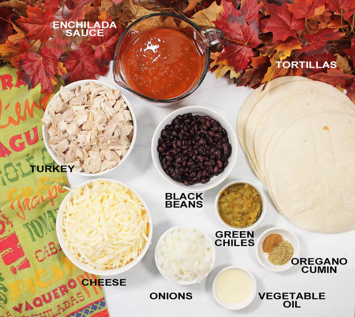 Turkey enchilada ingredients on table.