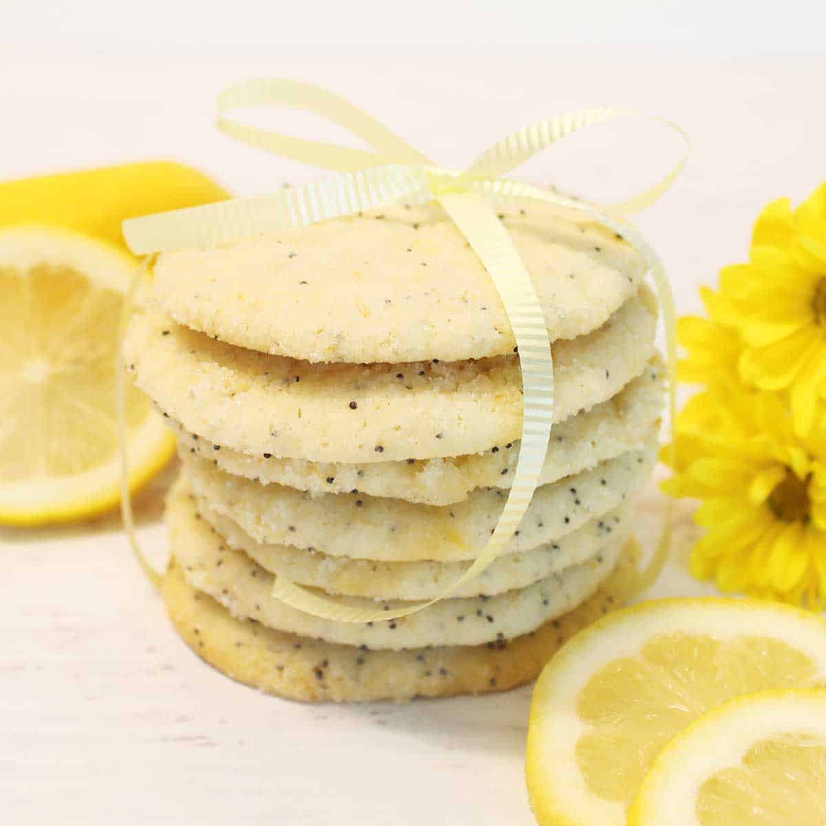 Lemon Poppy Seed Cookies ties with yellow ribbon with slices of lemon.