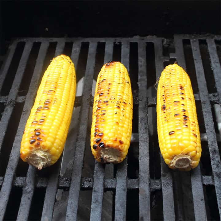Cooking corn on the grill.