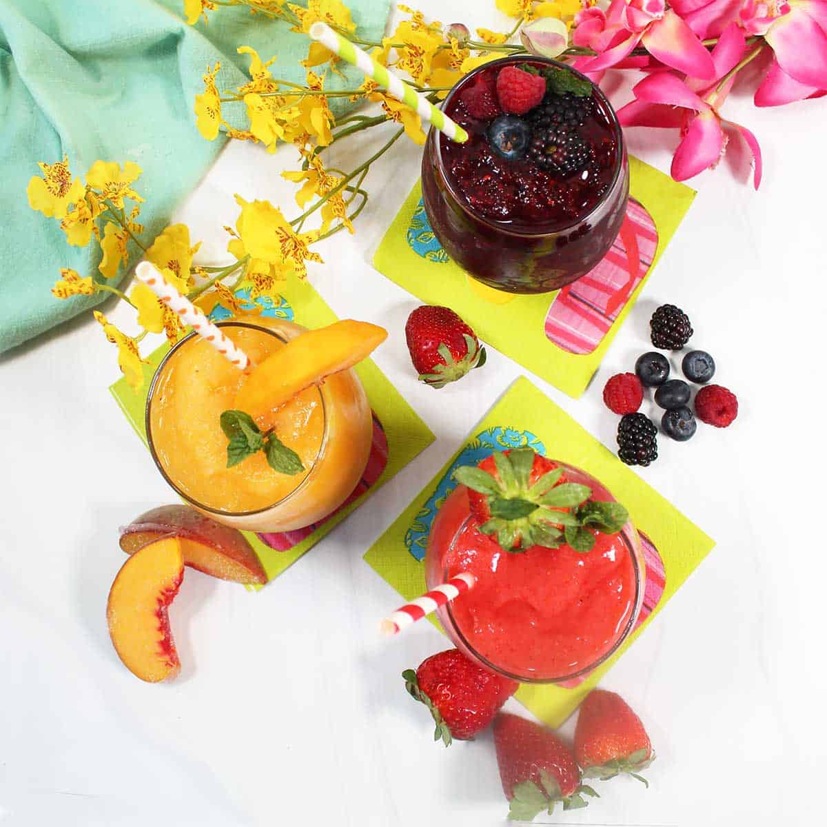 Overhead of fruit slushies.