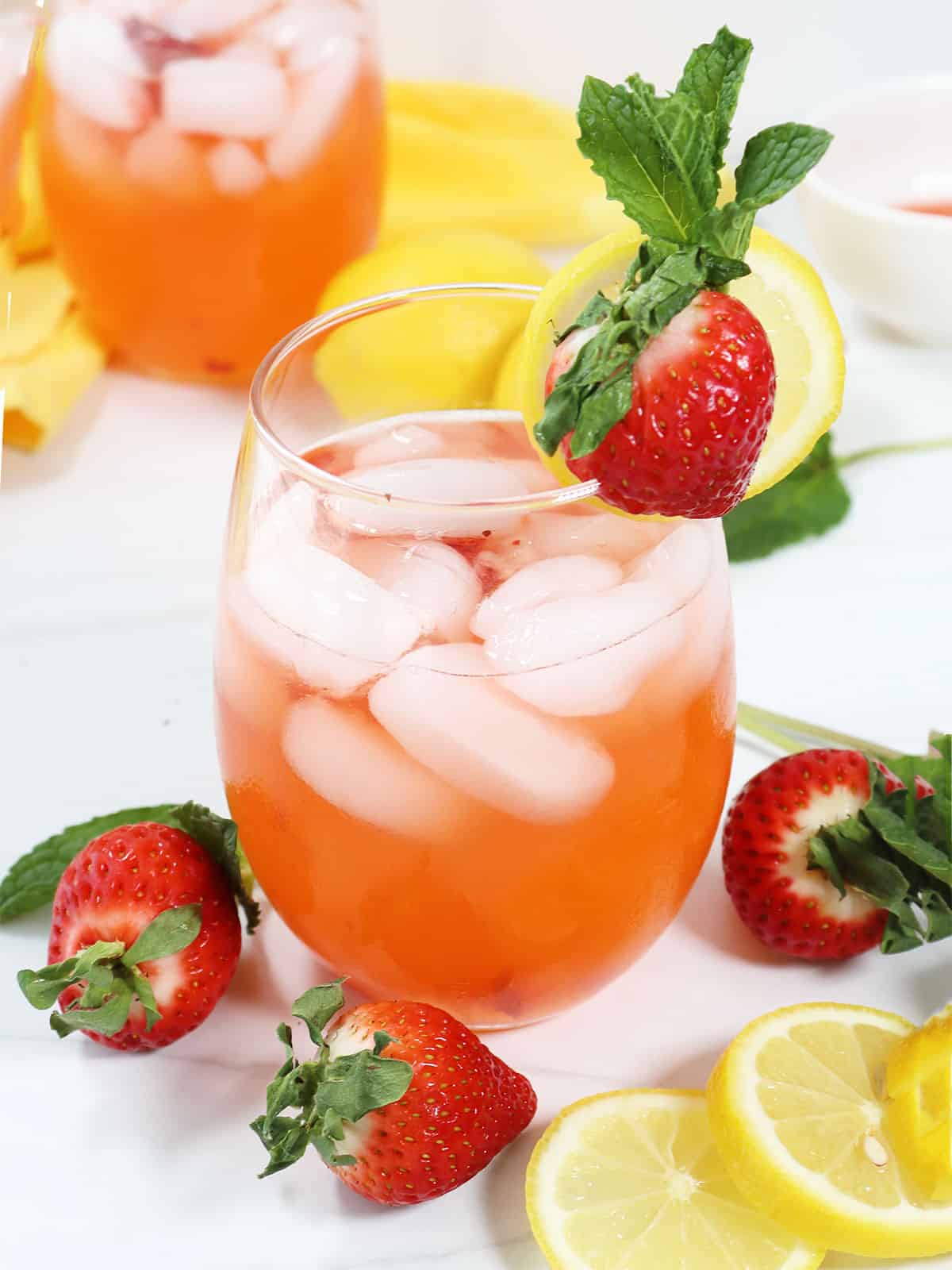 Garnished Strawberry Lemonade Cocktail with strawberry infused vodka.
