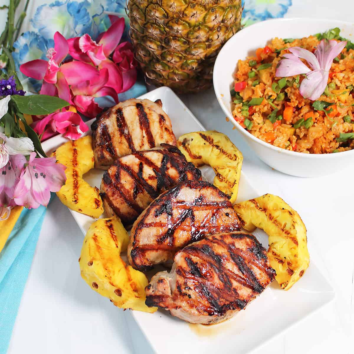 Dinner of grilled pork chops and pineapple rice.