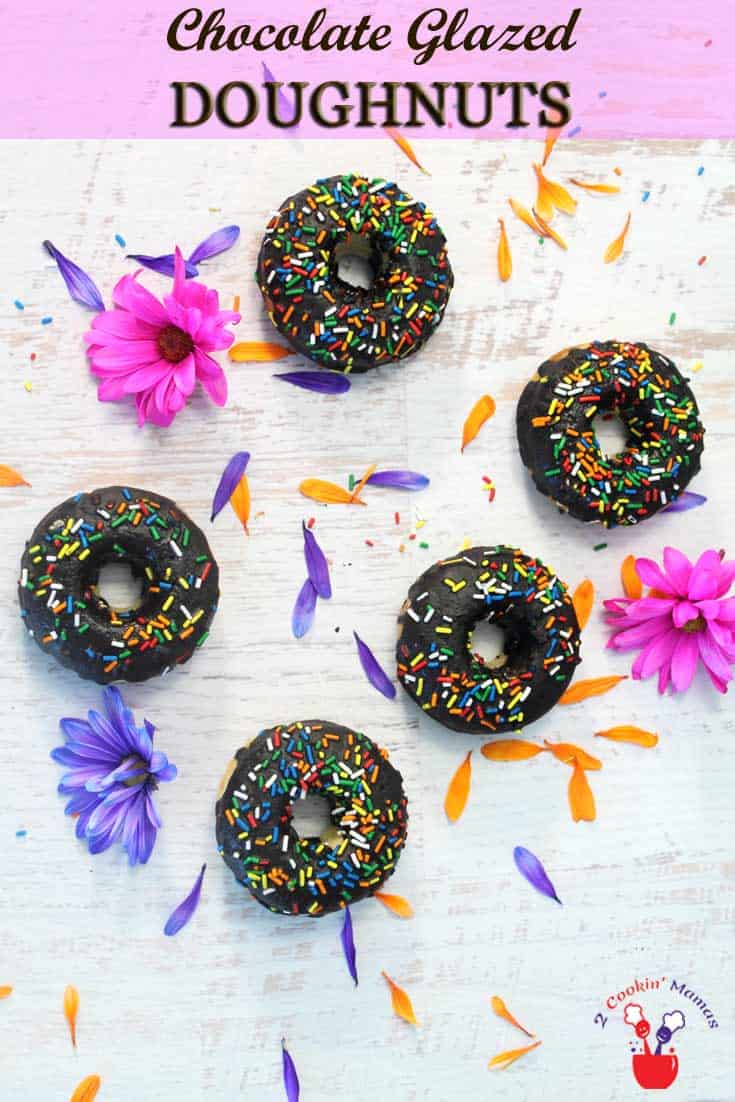 Gluten-free Vanilla Doughnuts with Chocolate Glaze | 2 Cookin Mamas Easy to make baked doughnuts that are moist, flavorful & gluten-free. Glaze with a delicious chocolate glaze & you won't be able to resist licking your fingers. #recipe #glutenfree