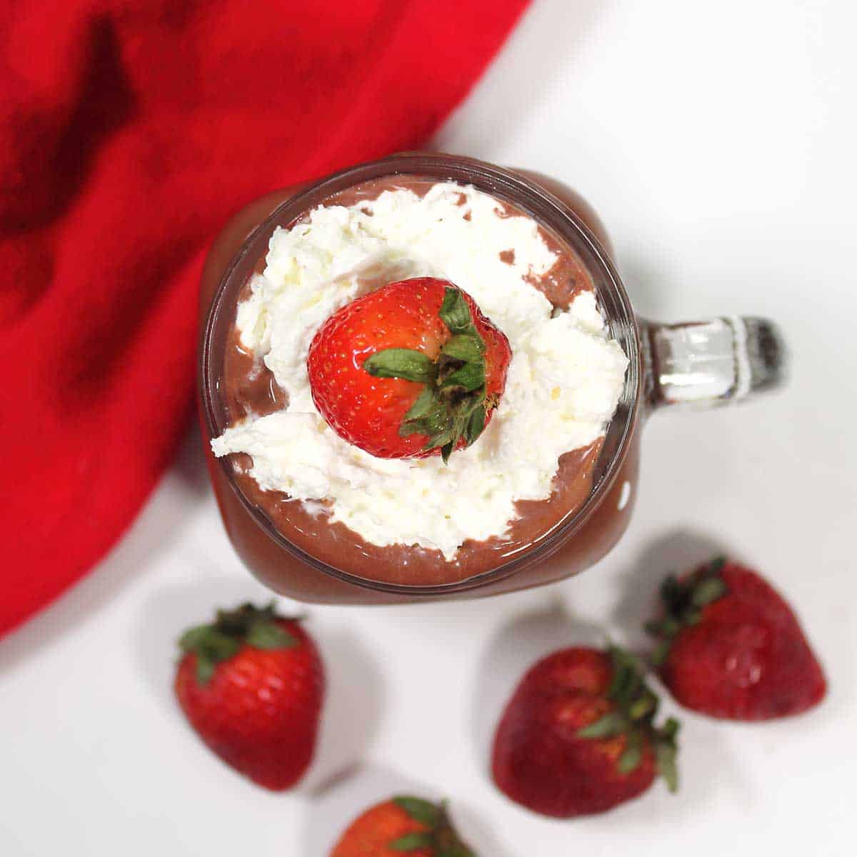 Overhead of strawberry chocolate smoothie.