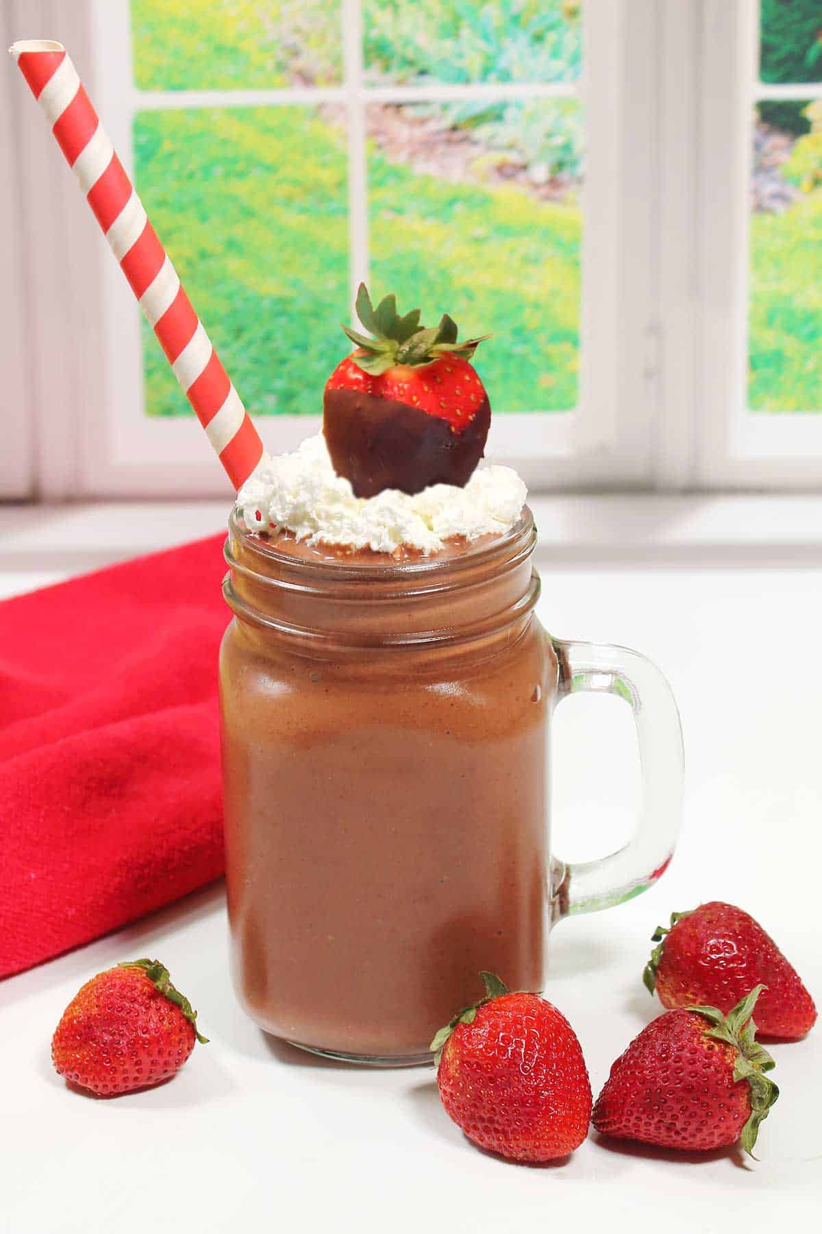 Chocolate Strawberry Smoothie with a chocolate covered strawberry on top.