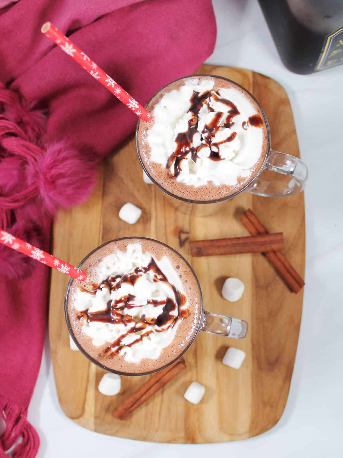Overhead of spiked hot chocolate with whipped cream.