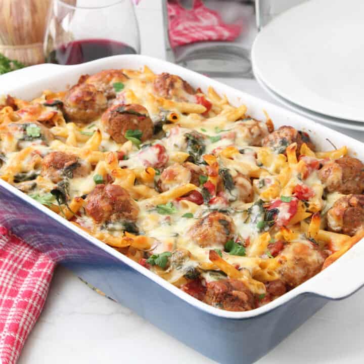 Baked casserole with wine and flowers.
