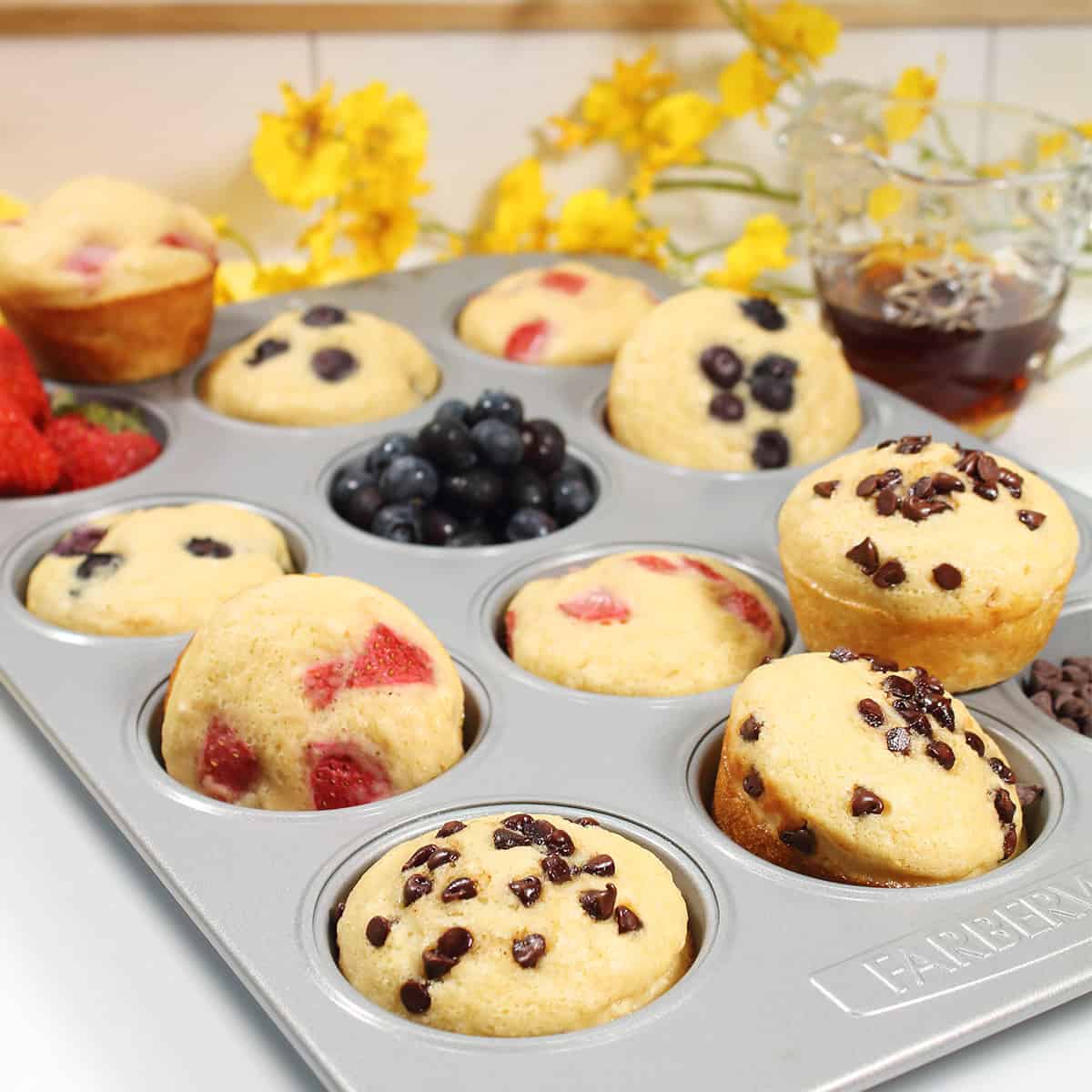 Variety of pancake muffins in muffin tin.