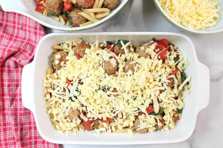 First layer of cheese on top of meatball mixture.