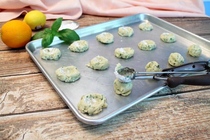 Lemon Basil Marmalade Cookies making thumbprint | 2 Cookin Mamas