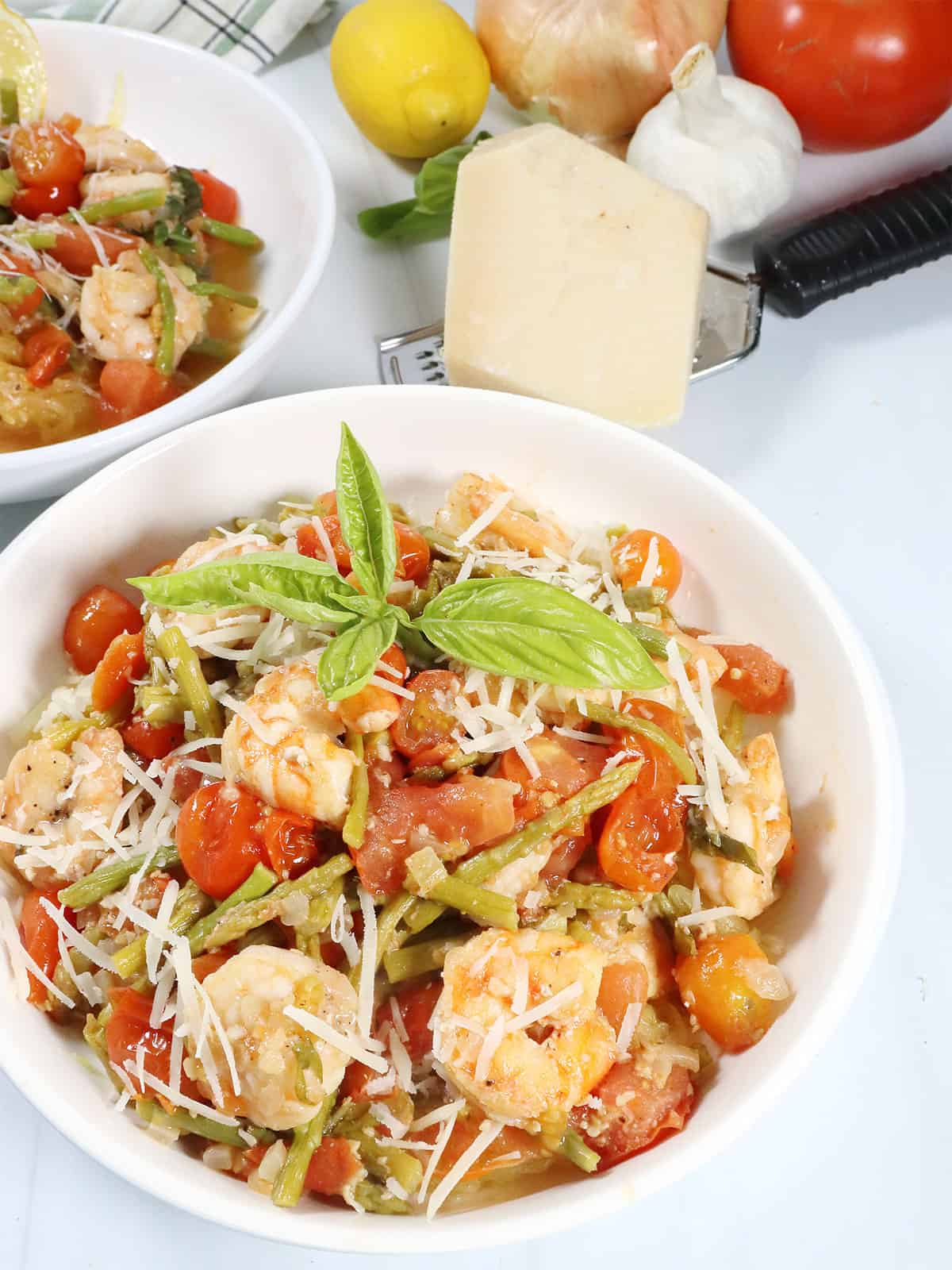 Spaghetti Squash Primavera with shrimp in serving bowl.