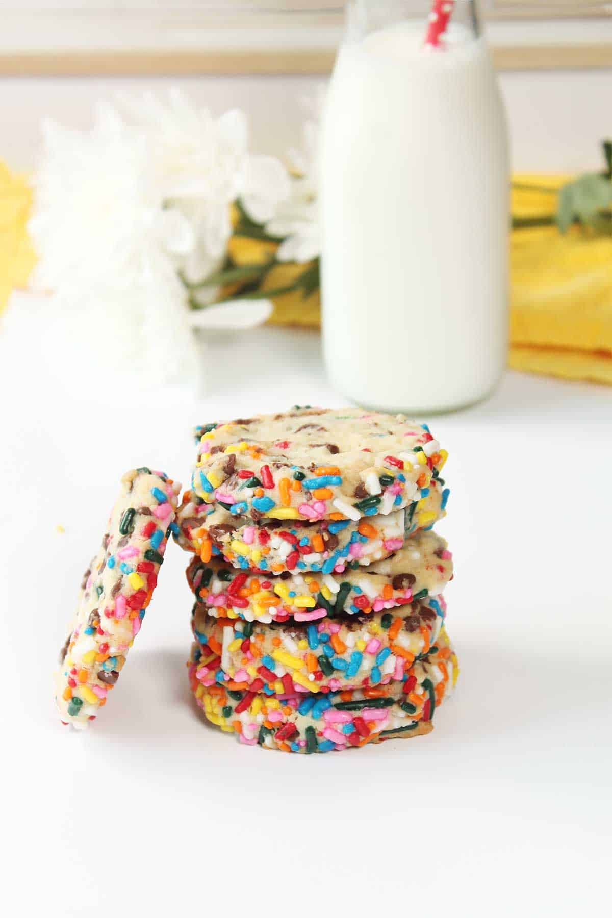Stack of cookies with one leaning.