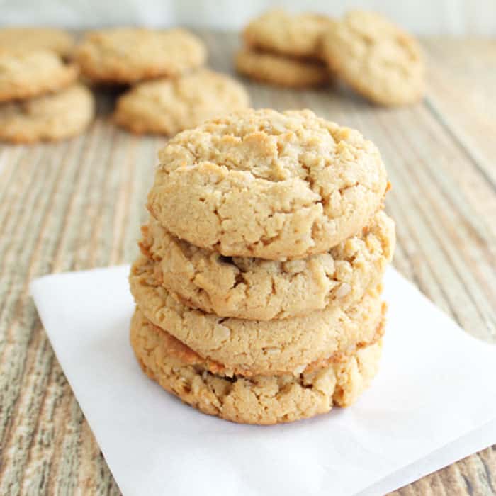stacked cookies on parchment paper.