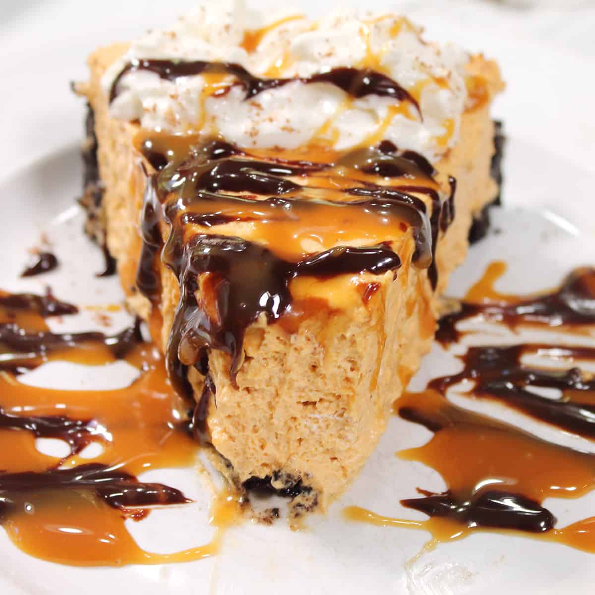 Front view of slice showing lightness of cheesecake.