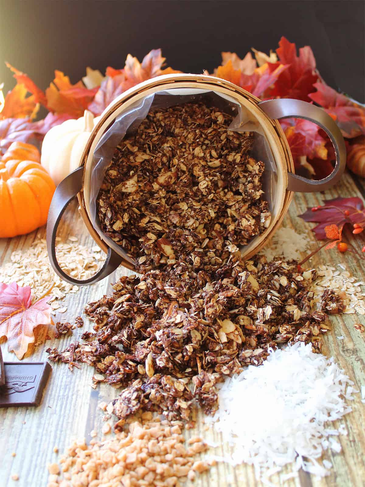 Chocolate Granola spilling out of basket.