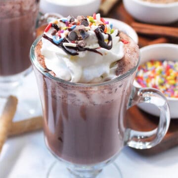 Closeup of mug of kahlua hot chocolate with toppings.
