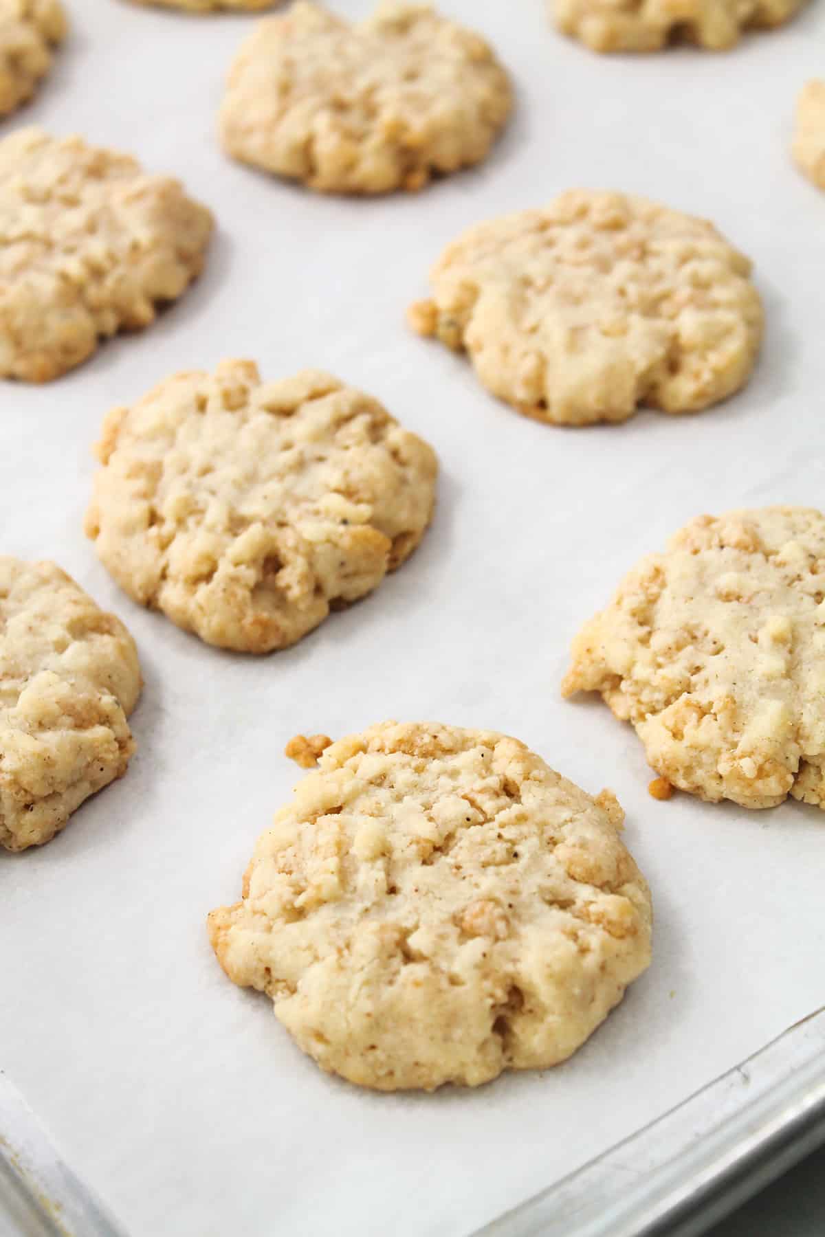 Baked cheese crackers on cookie sheet.