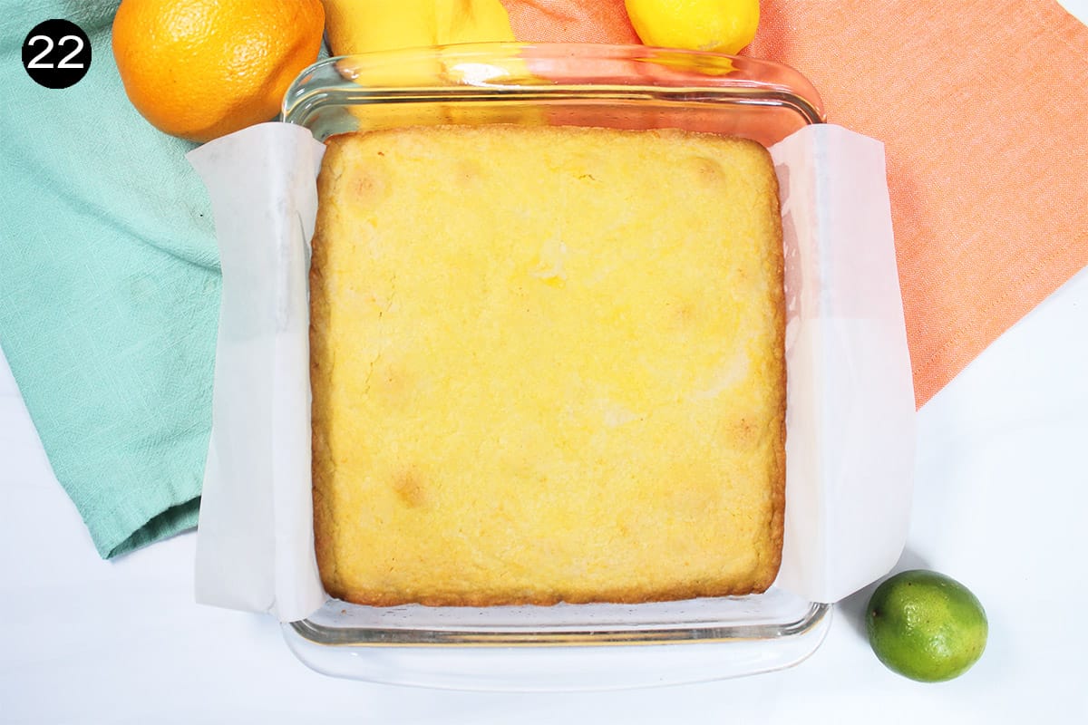 Baked citrus cookies in square baking dish.