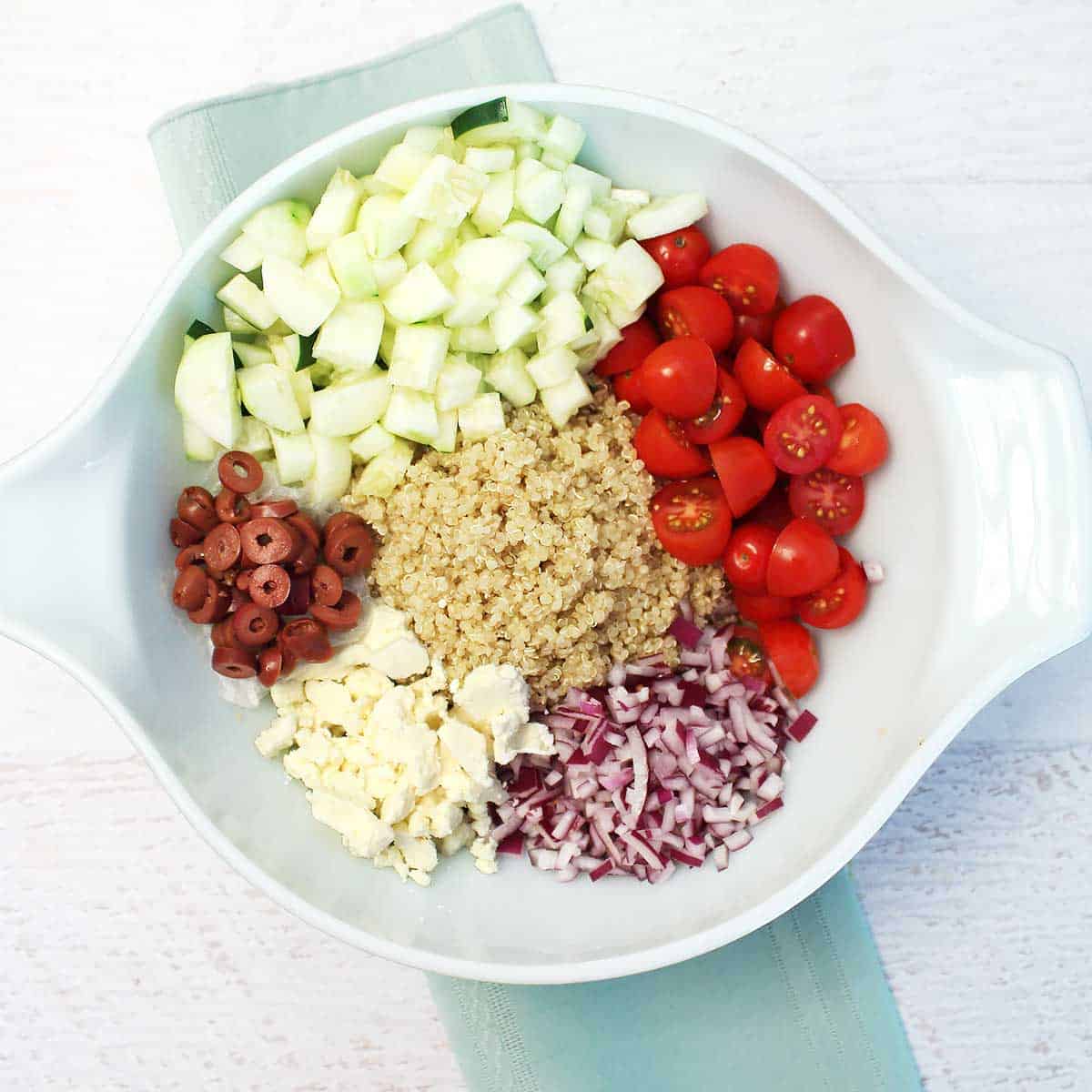 Place salad ingredients in a large bowl.