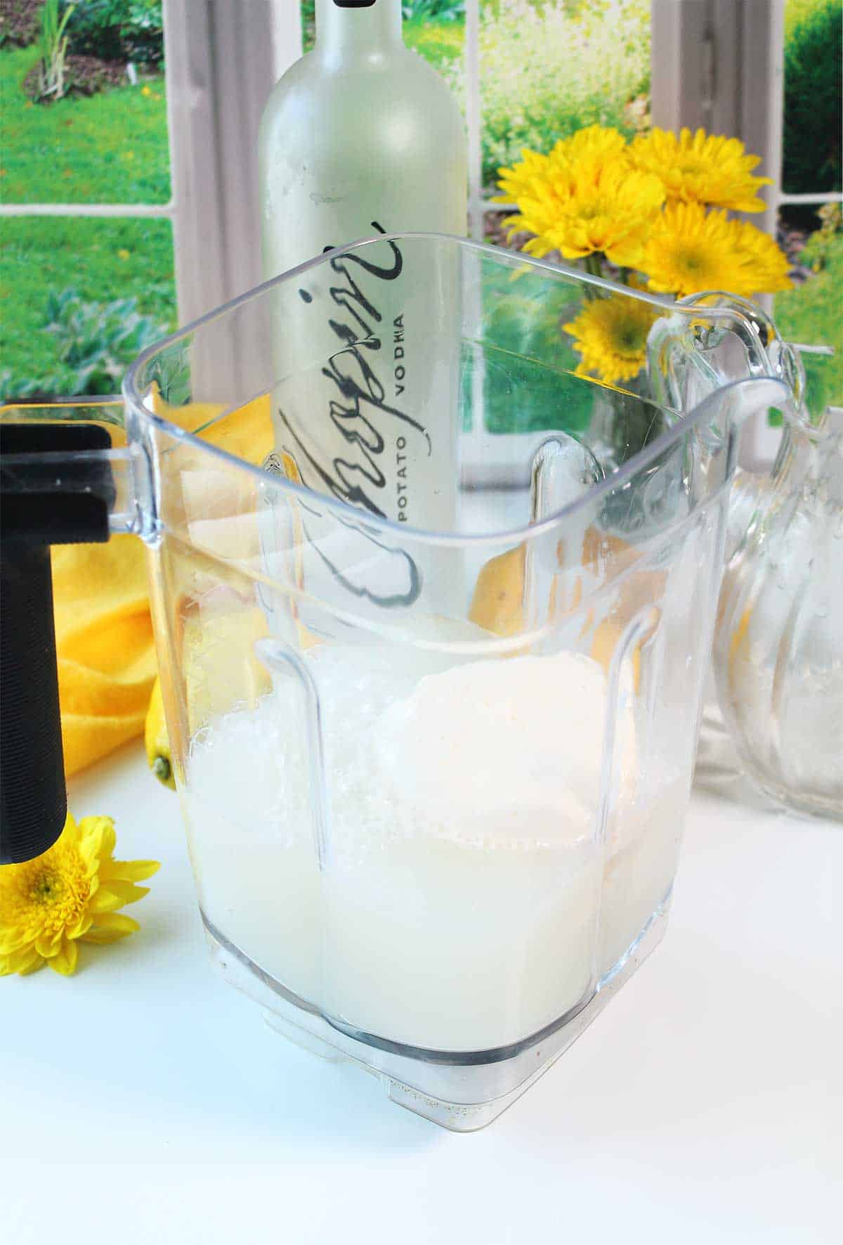 All ingredients for this vodka lemonade cocktail in blender.