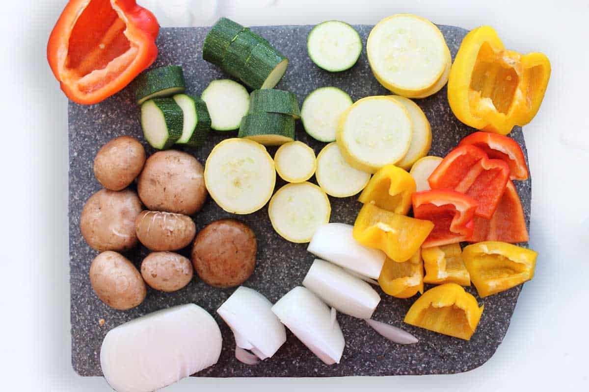 Cut up vegetables for skewers.