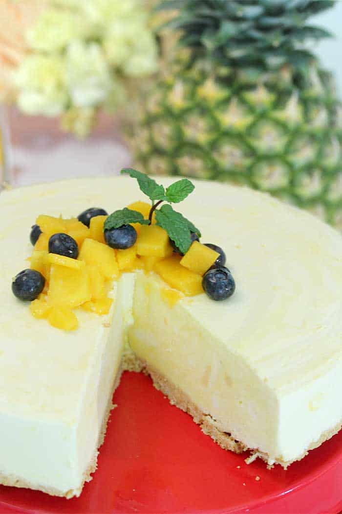 Mango Pineapple Icebox Cheesecake closeup without slice