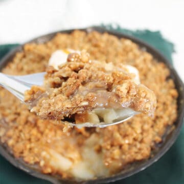 Serving scoop out of hot skillet.