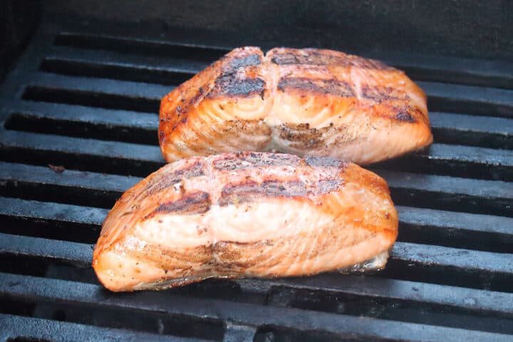 Grilling salmon on gas grill.