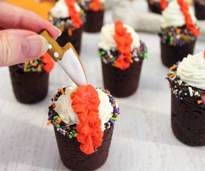 Halloween Chocolate Cherry Cookie Shots adding knife