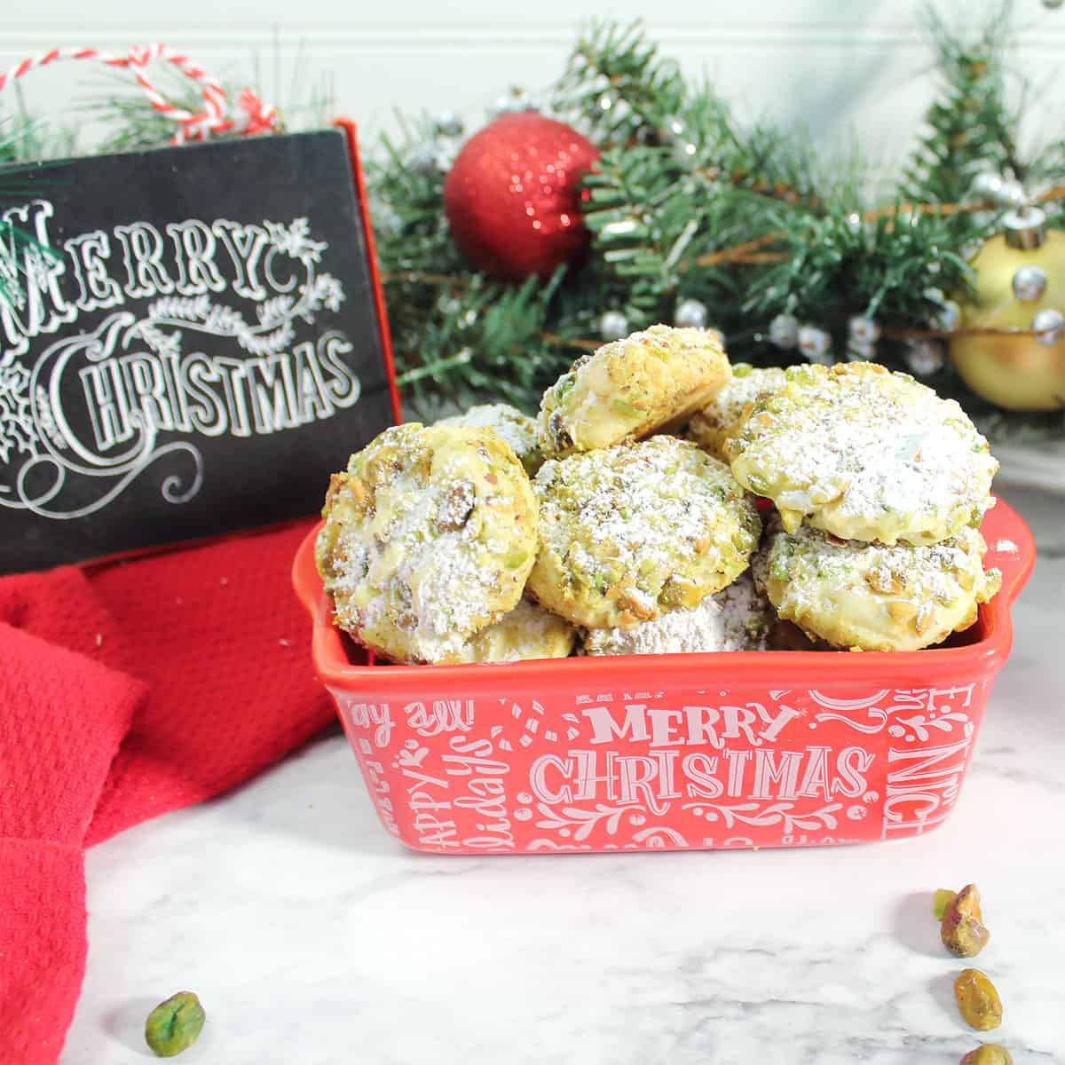Pistachio Shortbread Cookies in Christmas dish.