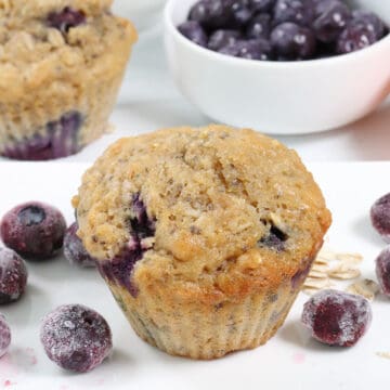 Single oatmeal muffin with blueberries.