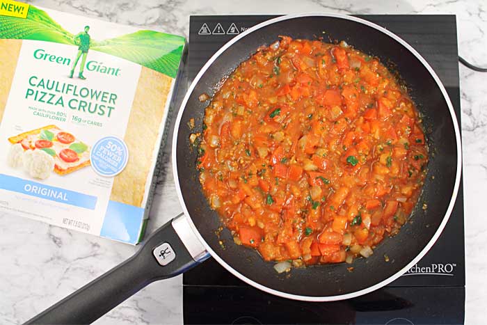 Shakshuka Breakfast Pizza sauce cooking