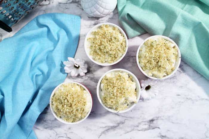 ramekins of mac and cheese ready to bake