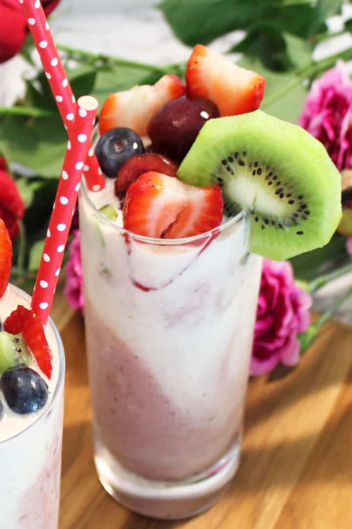 Closeup up of garnishes on single smoothie.