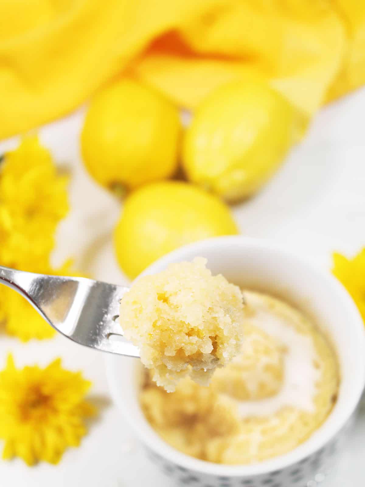Closeup of bite of mug cake on fork.