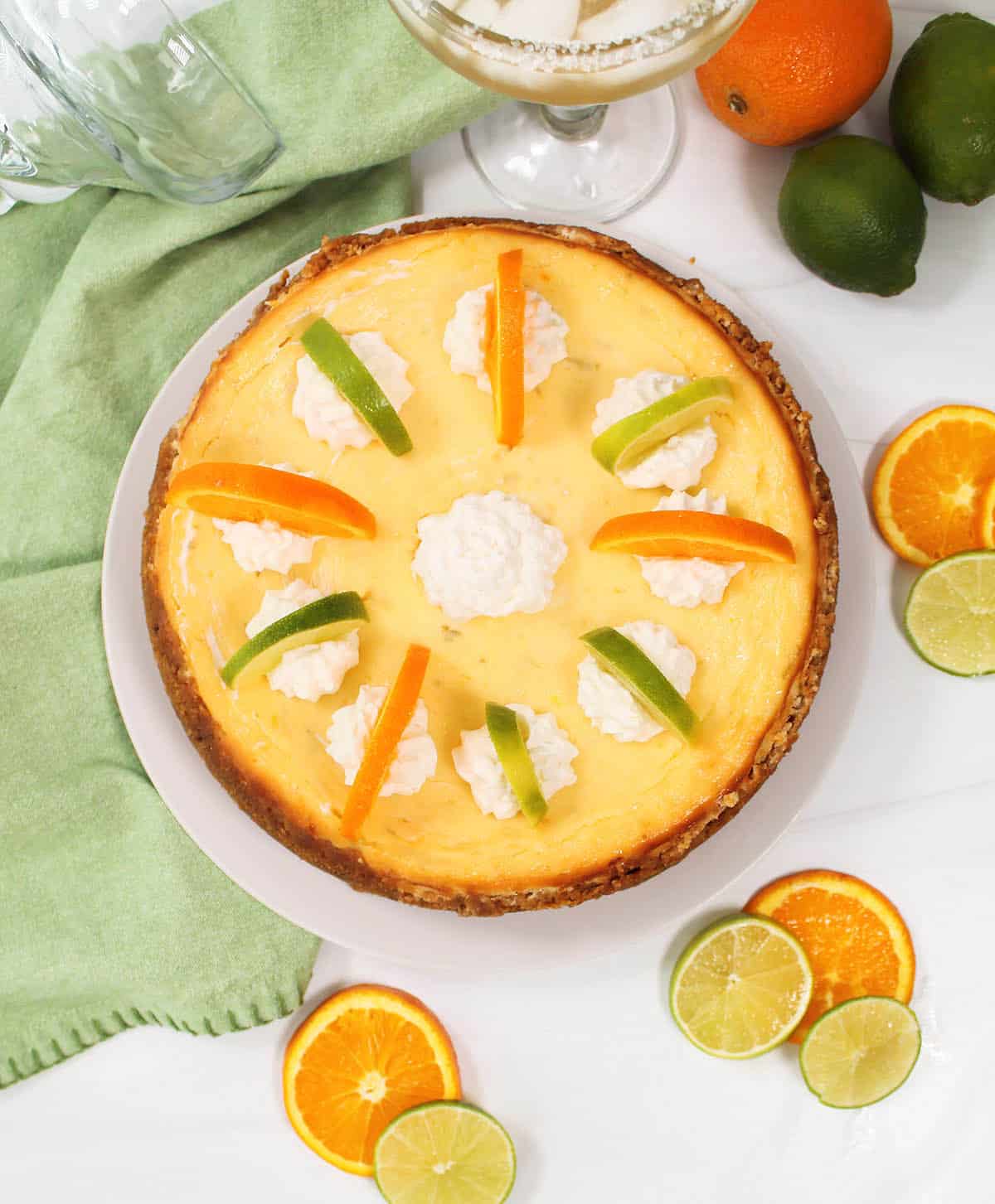Overhead of garnished lime margarita cheesecake.