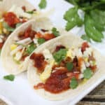 Closeup of Mexican tacos showing filling.