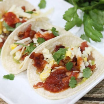 Closeup of Mexican tacos showing filling.