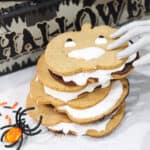 Stacked Halloween smores cookies with spider.