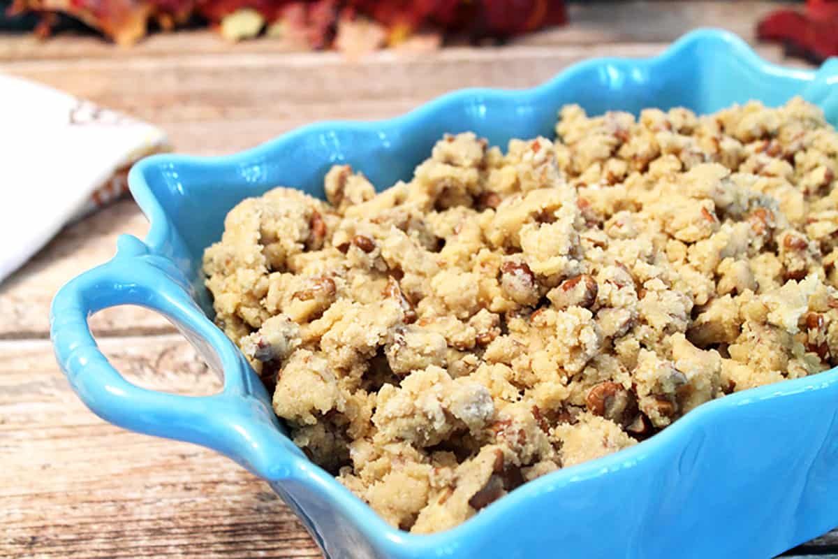 Crumble on top of sweet potatoes and ready for oven.