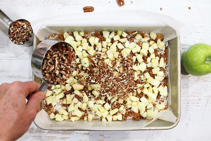 Layer with chopped apples then sprinkle with nuts.