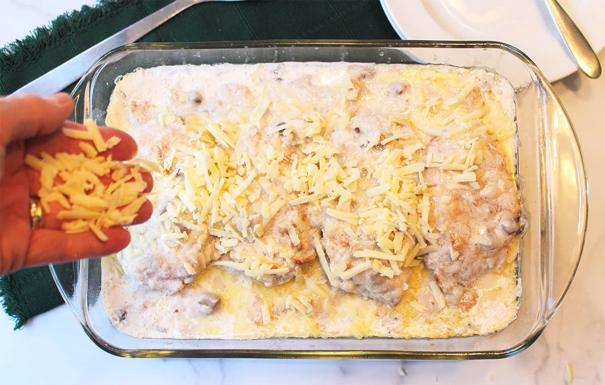 Final sprinkle of cheese before going back in oven.