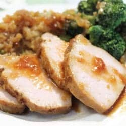 Honey Garlic Tenderloin dinner plated with broccoli and rice.