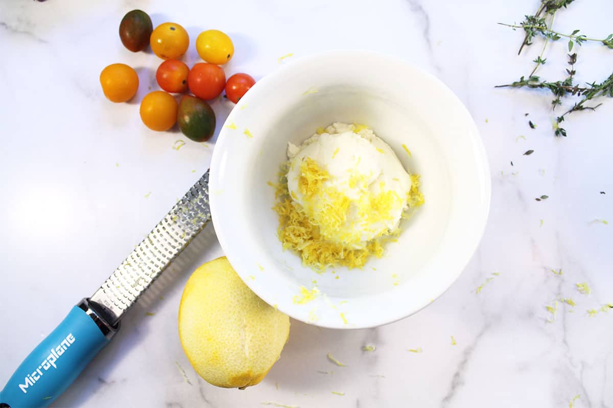 Flavoring ricotta with lemon zest.