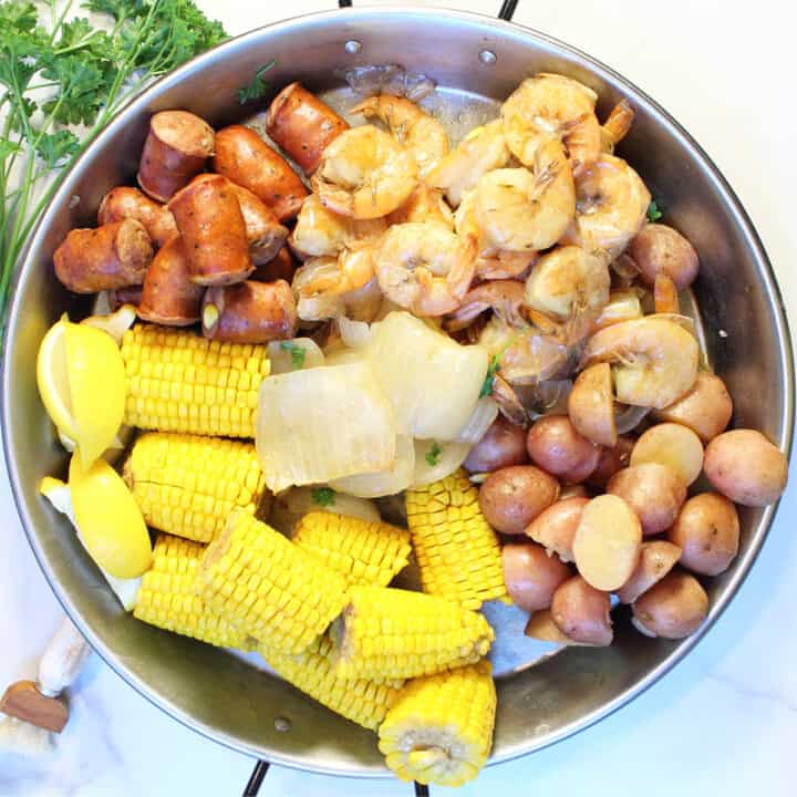 Overhead showing each ingredient in large pot.