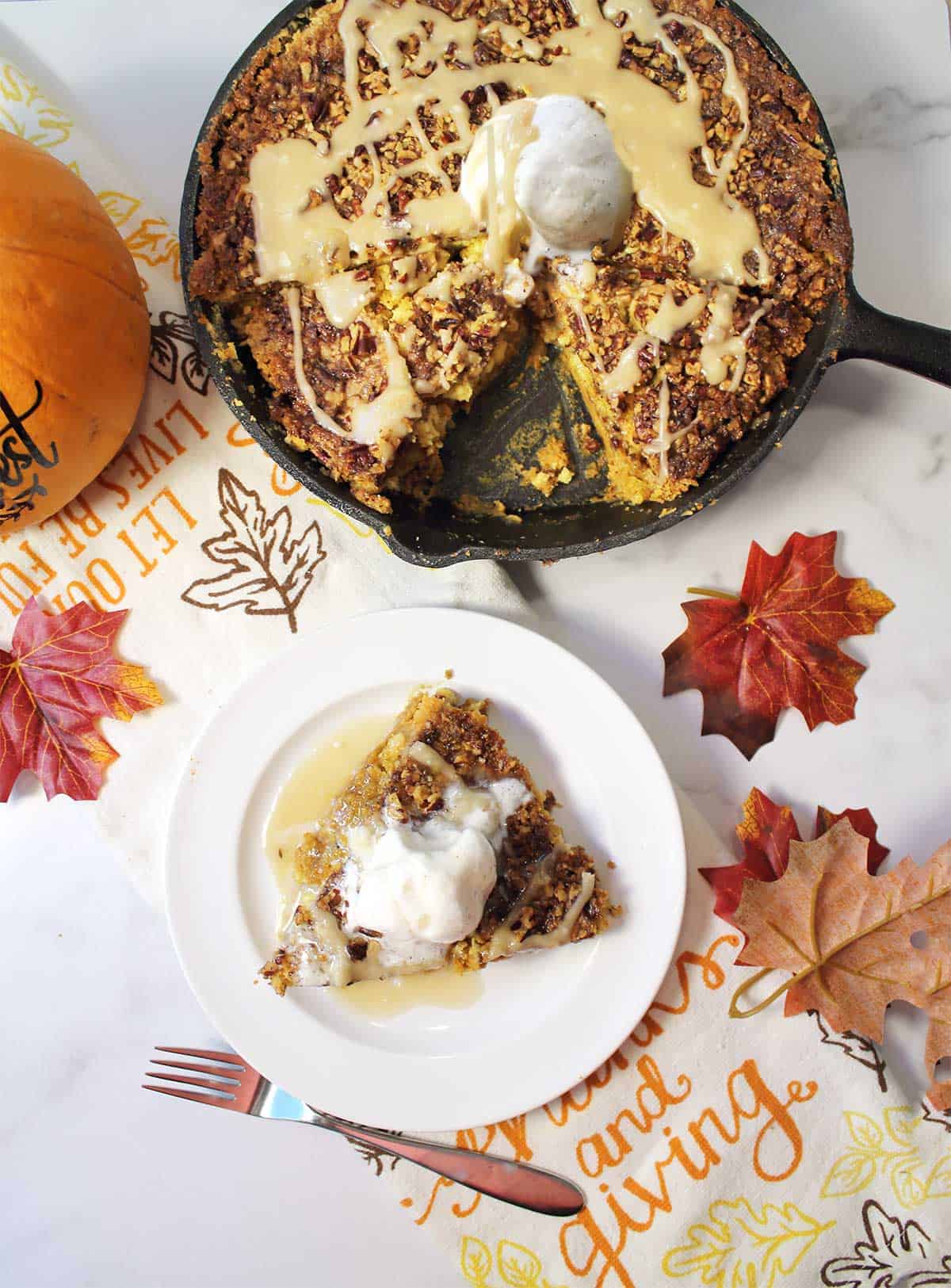 Pumpkin dump cake with slice out.