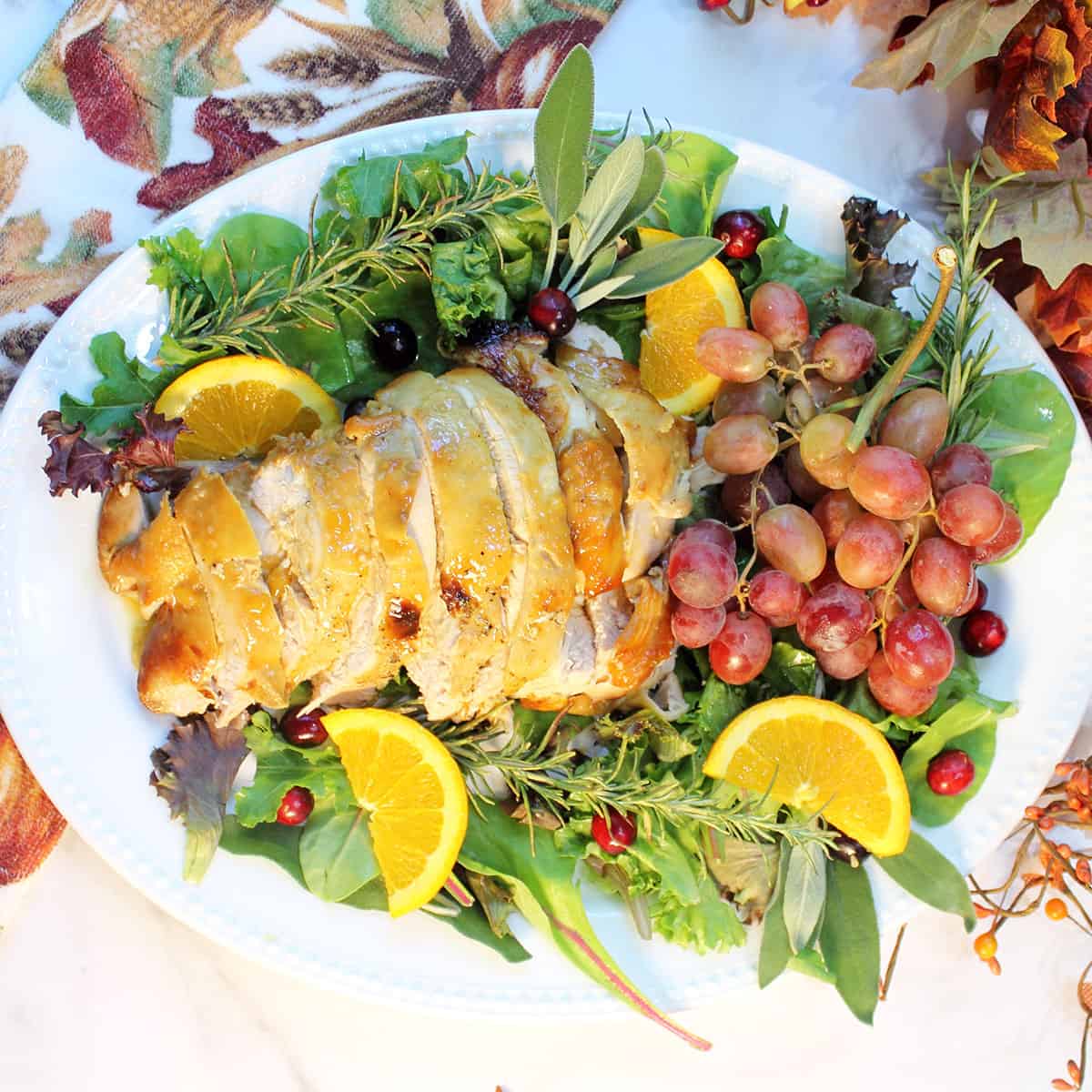 Overhead of sliced Honey Baked Turkey Breast on platter.